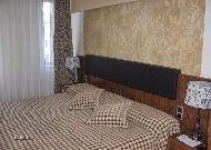 отель Avalon: cпальня в люксе отель Avalon: cпальня в люксе