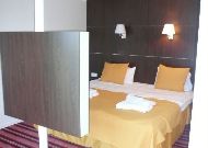 отель Meriton Conference & SPA Hotel: Спальня номера Suite