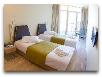 отель Amberton Green Apartments: Спальня люкс апартаментов