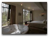 отель Belvilis SPA Hotel: Спальня в романтическом домике